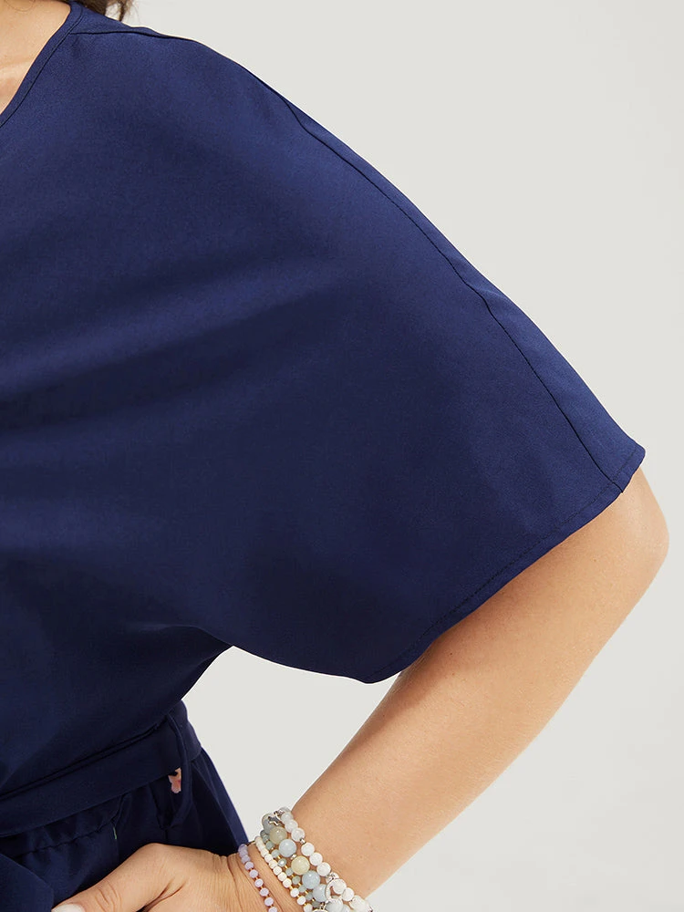 Floral Pocket Batwing Sleeve Surplice Neck Romper 10 Floral Pocket Batwing Sleeve Surplice Neck Romper - Image 8