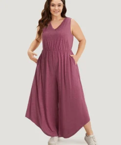 Plain Pocket Elastic Waist Asymmetrical Hem Jumpsuit